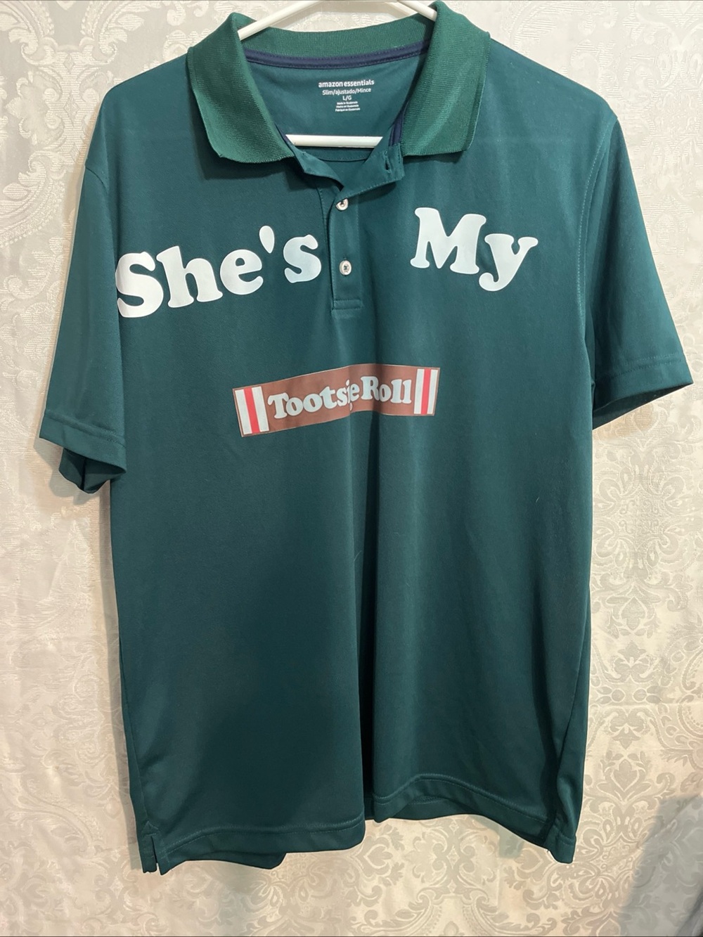 Amazon Essentials Green Polo with 'She's My' and Tootsie Roll Graphic